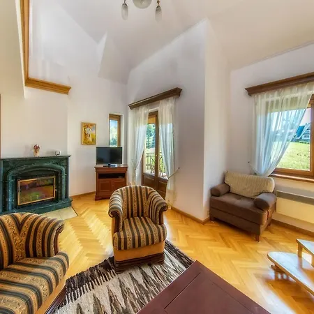 アパート Tatrytop Apartament Heban Z Kominkiem ザコパネ