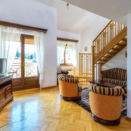 アパート Tatrytop Apartament Heban Z Kominkiem ザコパネ